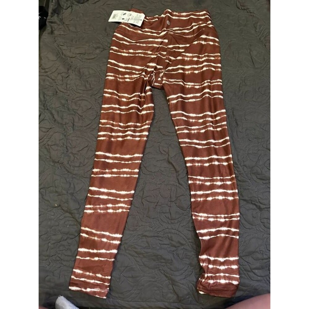 Scorpio Sol leggings, size medium